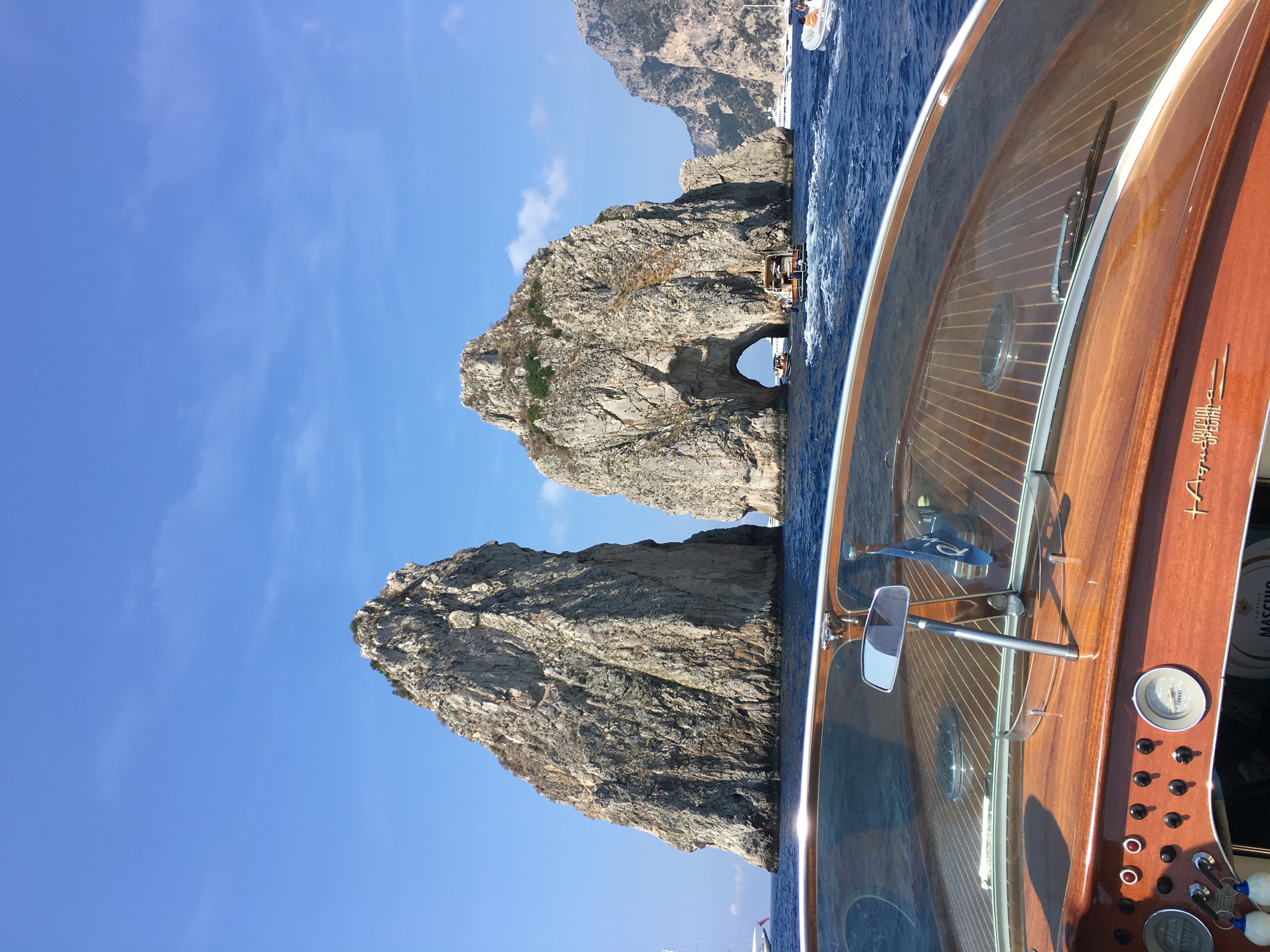 Riva Aquarama Special in Capri, Italy in front of the famous Faraglioni. Photograph by The Traveling Gentleman @travelinggentleman 